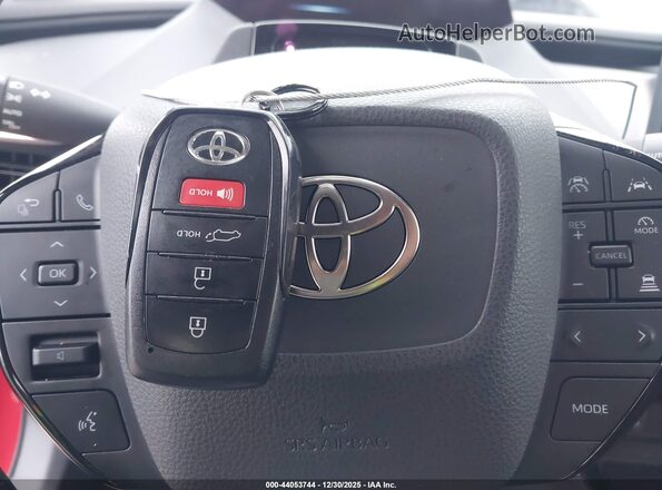 JTDACACU7R3033802 2024 TOYOTA PRIUS PRIME Red Vista del salpicadero