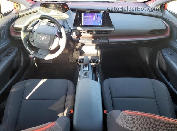 JTDACACU9R3039746 2024 TOYOTA PRIUS Red Dashboard view