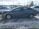 2021 Toyota Prius L Eco Gray vin: JTDKAMFU2M3140109
