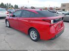 2021 Toyota Prius L Eco Красный vin: JTDKAMFU8M3131284