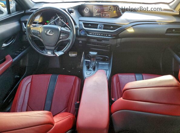 JTHR9JBH5M2037947 2021 LEXUS UX Белый Вид панели приборов