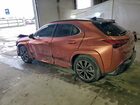 2025 Lexus Ux 300h Base Orange vin: JTHUCJDH7S2003952