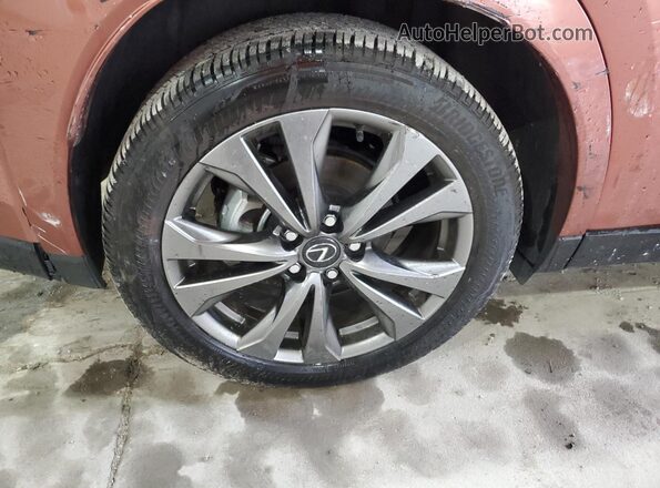 JTHUCJDH7S2003952 2025 LEXUS UX Orange 