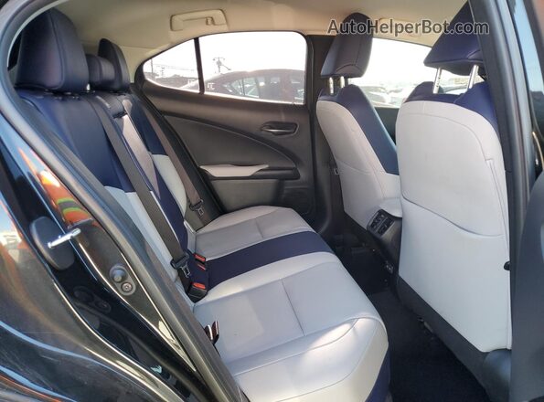JTHX3JBH5M2032109 2021 LEXUS UX Charcoal Vista interior trasera