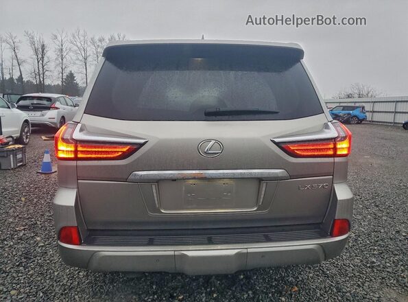 JTJHY7AX2K4288967 2019 LEXUS LX Серебряный Вид сзади
