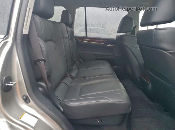 JTJHY7AX2K4288967 2019 LEXUS LX Серебряный Вид задней части салона
