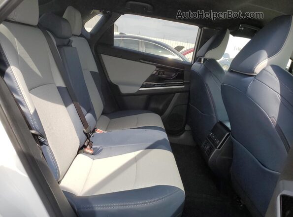 JTMABABA7SA093302 2025 SUBARU SOLTERRA White Vista interior trasera