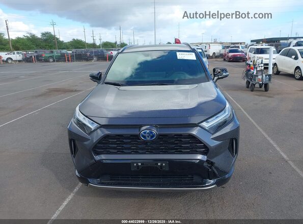 JTME6RFV1RJ040591 2024 TOYOTA RAV4 HYBRID Gray Вид задньої частини салону