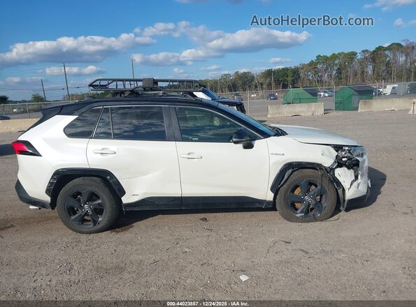 JTME6RFV3LD501957 2020 TOYOTA RAV4 HYBRID White Widok wnętrza z tyłu