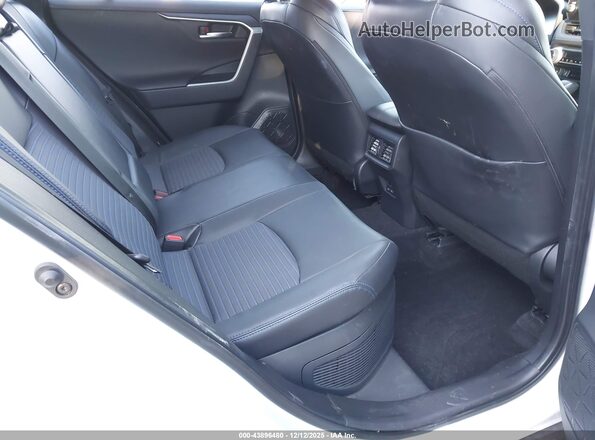 JTME6RFV7PJ038616 2023 TOYOTA RAV4 HYBRID White VIN კოდის სტიკერის ხედი