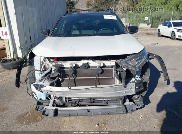 JTMEWRFV2KJ015298 2019 TOYOTA RAV4 HYBRID White Vista interior trasera