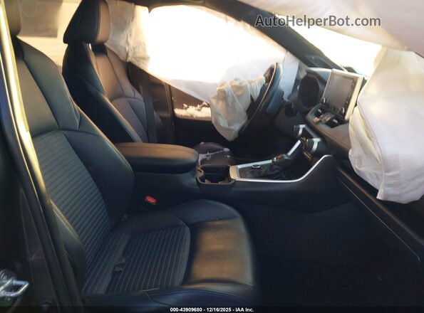 JTMEWRFV5KJ016459 2019 TOYOTA RAV4 HYBRID Gray Front interior view