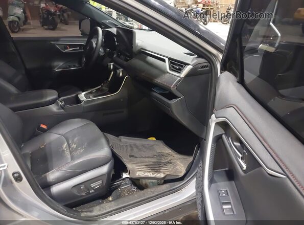JTMFB3FV2RD186445 2024 TOYOTA RAV4 PRIME Серый Вид салона спереди