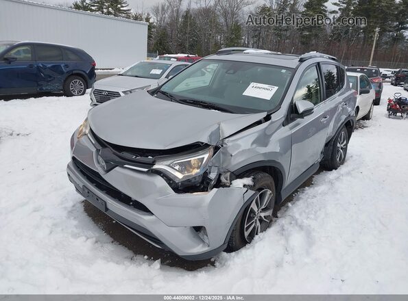JTMRFREV9JJ212082 2018 TOYOTA LE Серебряный Передняя левая четверть