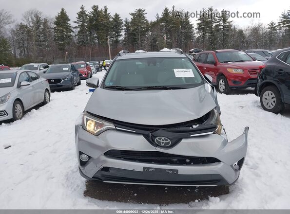 JTMRFREV9JJ212082 2018 TOYOTA LE Серебряный Вид задней части салона