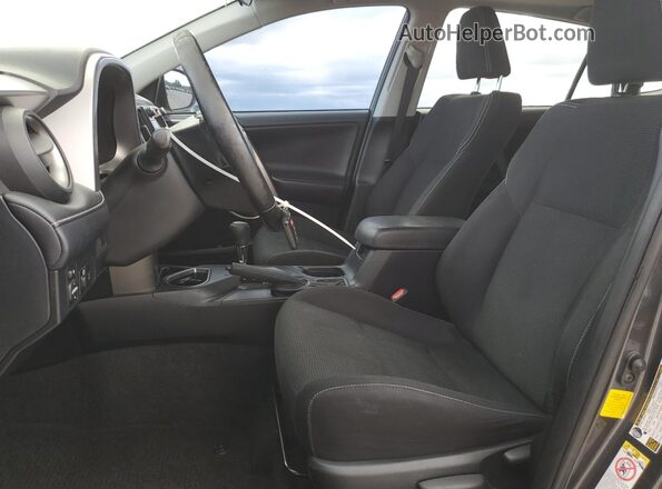 JTMWFREV3JJ184766 2018 TOYOTA RAV4 Charcoal Vista interior delantera