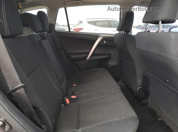 JTMWFREV3JJ184766 2018 TOYOTA RAV4 Charcoal Vista interior trasera