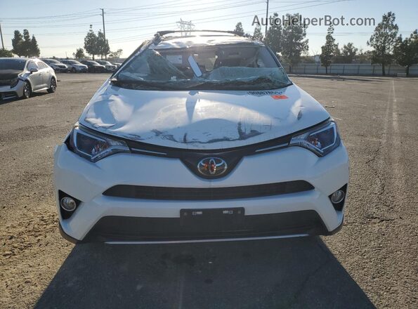 JTMWFREV7JJ724751 2018 TOYOTA RAV4 White Vista frontal
