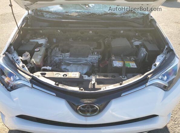 JTMWFREV7JJ724751 2018 TOYOTA RAV4 White Vista interior trasera
