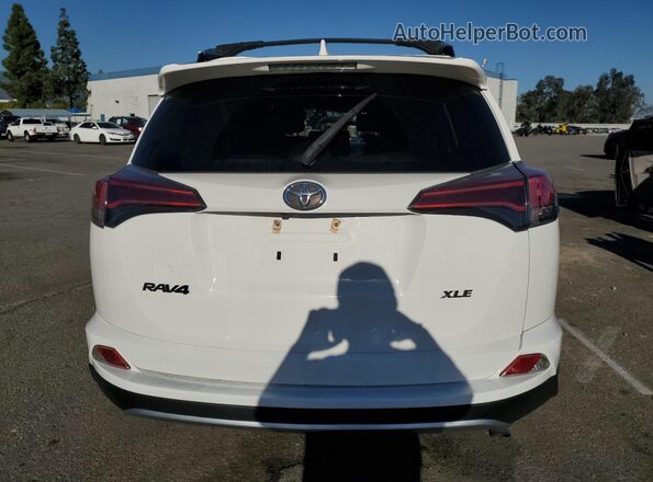 JTMWFREV7JJ724751 2018 TOYOTA RAV4 White Vista trasera