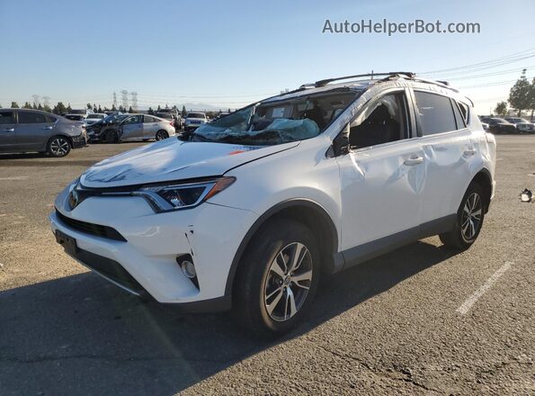 JTMWFREV7JJ724751 2018 TOYOTA RAV4 White Vista tres cuartos delantera izquierda