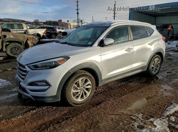 KM8J3CA24GU038679 2016 HYUNDAI TUCSON Серебряный Передняя левая четверть