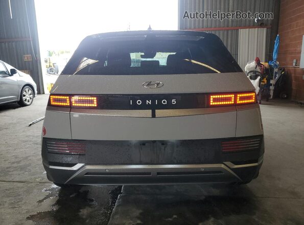 KM8KN4DE4RU299565 2024 HYUNDAI IONIQ Серый Вид сзади