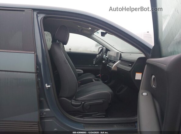 KM8KNDAF4PU230305 2023 HYUNDAI IONIQ 5 Бирюзовый Вид салона спереди