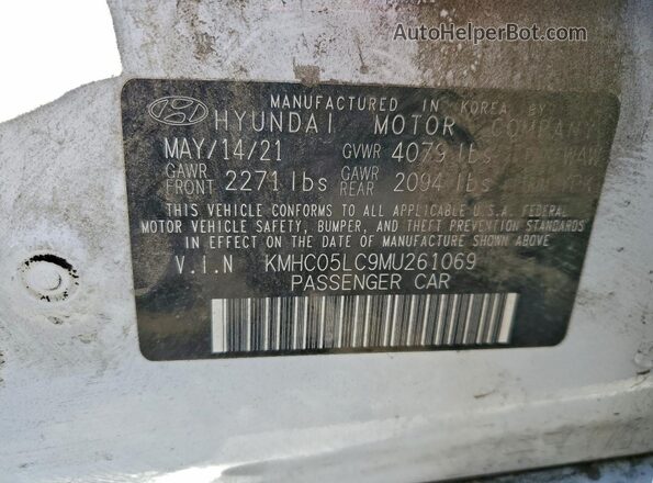 KMHC05LC9MU261069 2021 HYUNDAI IONIQ White Вид наклейки з VIN-кодом