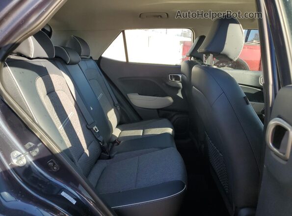 KMHRC8A38PU260313 2023 HYUNDAI VENUE Синий Вид задней части салона