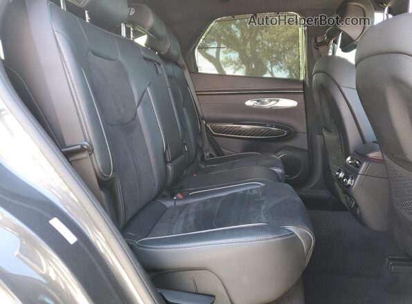 KMUMCDTC2NU041958 2022 GENESIS GV70 Gray Vista interior trasera