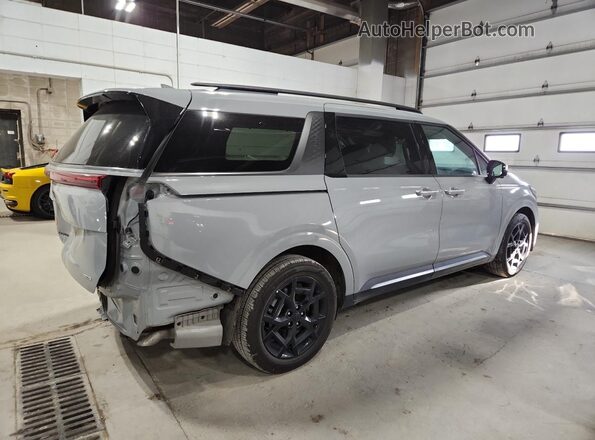 KNDNE5KAXS6044761 2025 KIA CARNIVAL Серый Задняя правая четверть