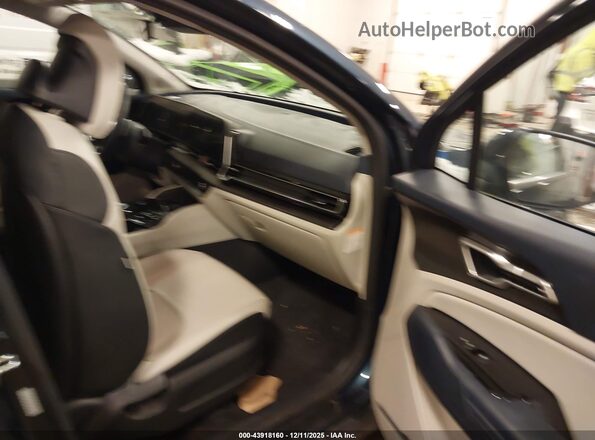 KNDPVCAG9P7075746 2023 KIA SPORTAGE HYBRID Синий Вид салона спереди