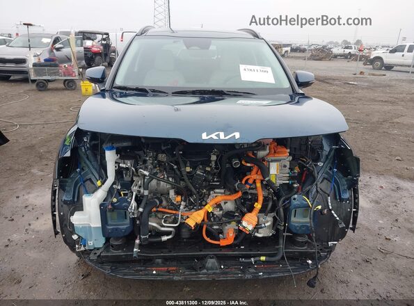 KNDPVCDG6R7134380 2024 KIA SPORTAGE HYBRID Синий Вид задней части салона