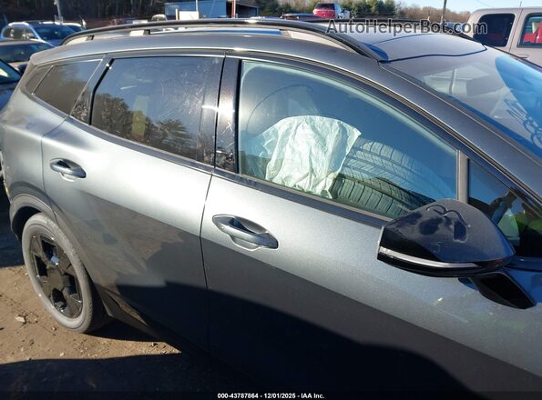 KNDPVDDG4T7305396 2026 KIA SPORTAGE HYBRID Серый Вид задней части салона