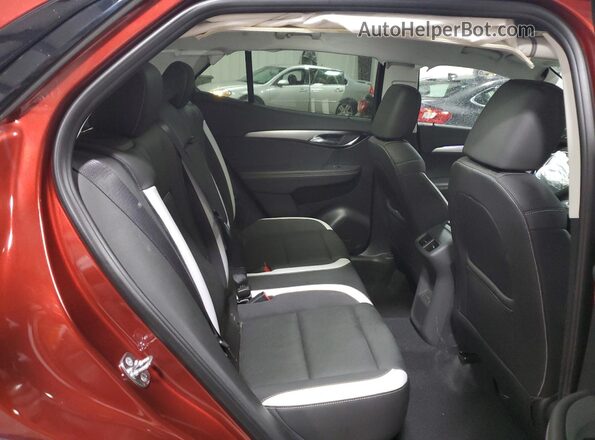 LRBFZPE43RD014662 2024 BUICK ENVISION Red Vista interior trasera