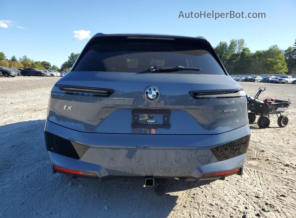 WB523CF01PCM83642 2023 BMW IX Gray Rear view