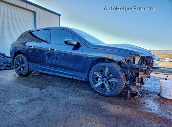WB523CF05PCL75847 2023 BMW IX Черный Передняя правая четверть