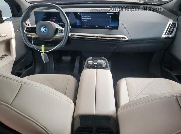 WB523CF05PCM90920 2023 BMW IX Красный Вид панели приборов
