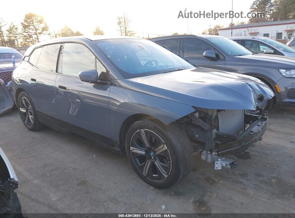 WB523CF09PCL74619 2023 BMW IX Blue Front right