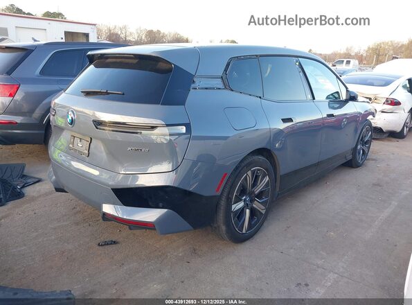 WB523CF09PCL74619 2023 BMW IX Blue Rear right