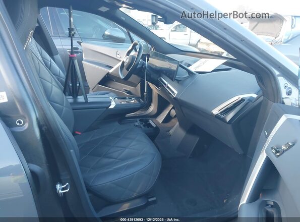 WB523CF09PCL74619 2023 BMW IX Blue Front interior view