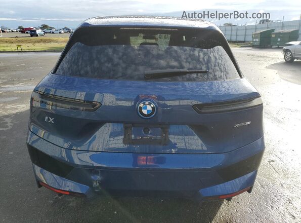 WB523CF09SCT11562 2025 BMW IX Blue Widok z tyłu