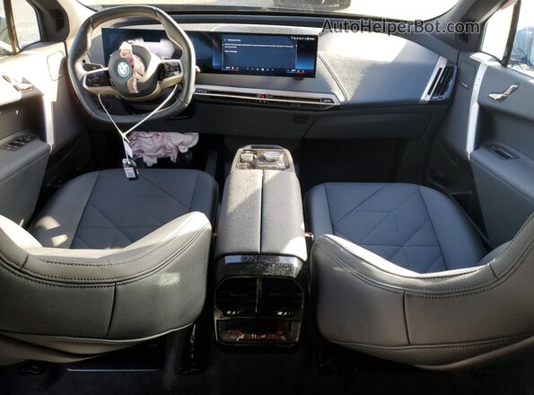 WB523CF09SCT11562 2025 BMW IX Blue Widok deski rozdzielczej