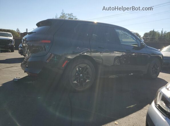 WB543CF09TCV29561 2026 BMW IX Черный Задняя правая четверть