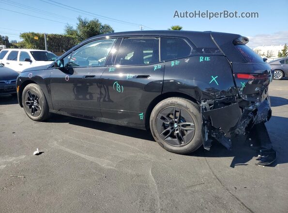 WB543CF09TCV29561 2026 BMW IX Черный Задняя левая четверть