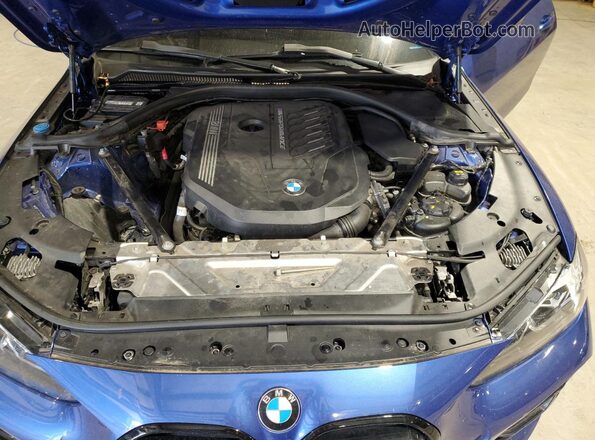 WBA13AR02MCF64094 2021 BMW M4 Blue Սալոնի հետևի տեսք