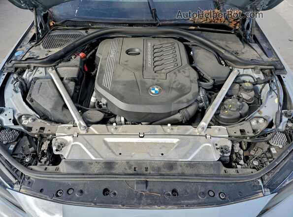 WBA13AR02PCL63345 2023 BMW M4 Синий Вид задней части салона