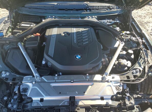 WBA13AW09RFT28789 2024 BMW M4 Зеленый Вид задней части салона