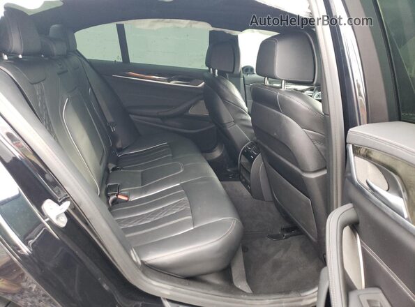 WBA13BK06MCF08305 2021 BMW M5 Black Вид задніх сидінь